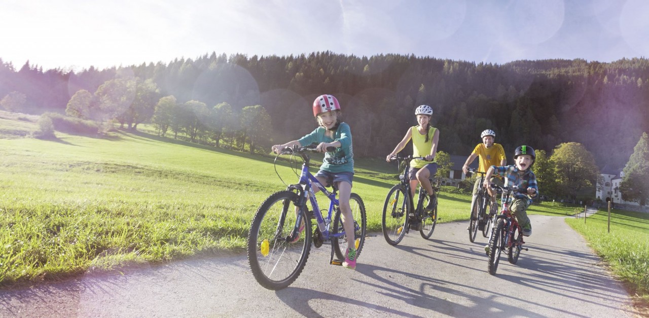Cycling trip with the family during a summer holiday in Flachau
